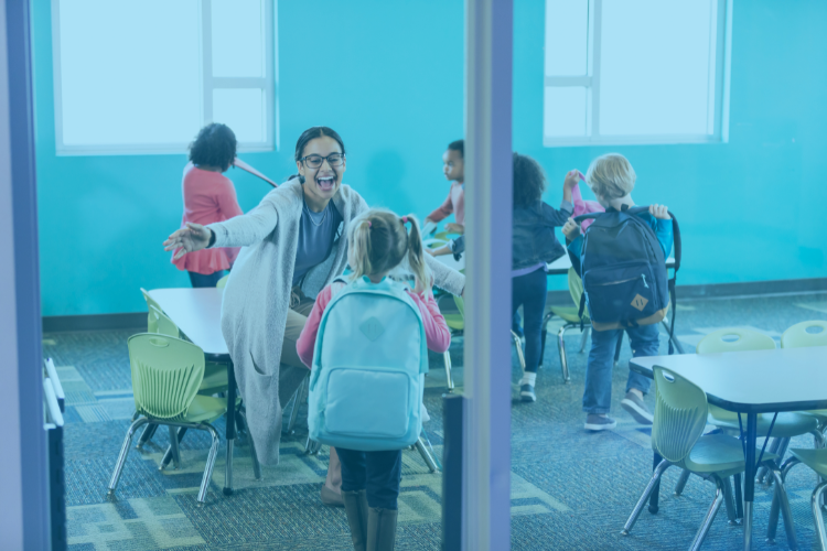 teacher greeting student walking into class