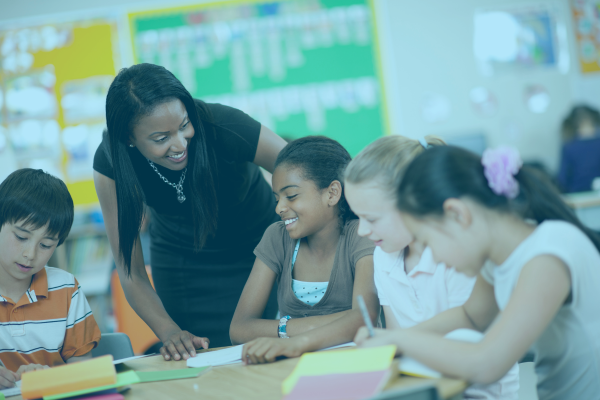 teacher and student smiling